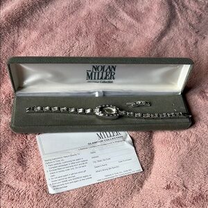 Vintage Nolan Miller Elegant Silver Watch